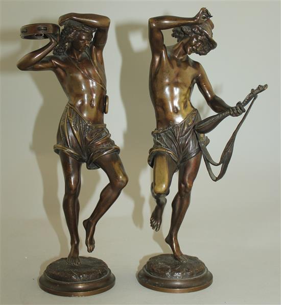 Albert Carrier Belleuse (French, 1824-1887). Danseurs Napolitains, a pair of patinated bronze figures of musicians, 10.5in.